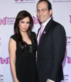 With his wife Julie Banderas
